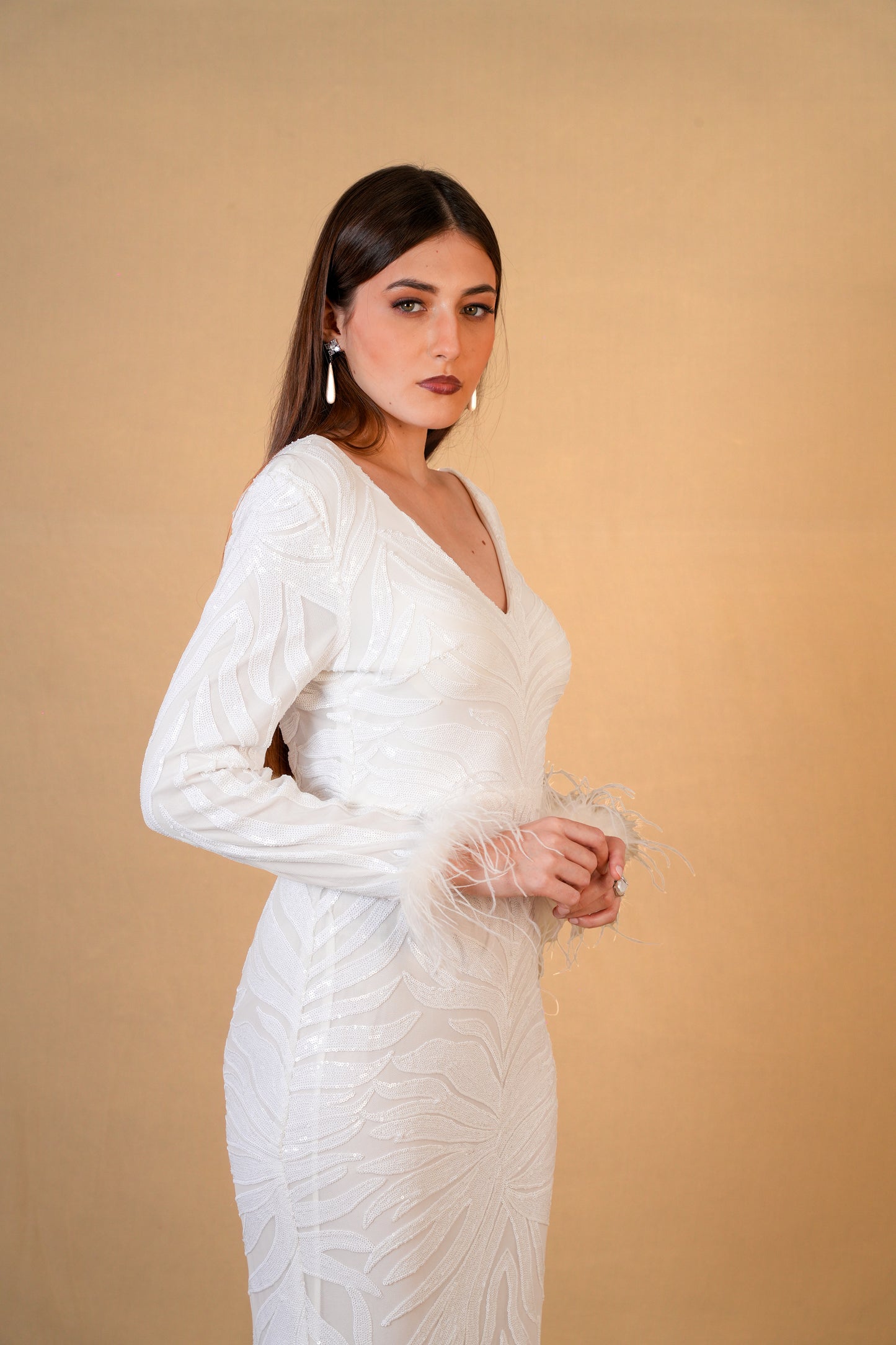 White Sequin Feather Sleeve Gown